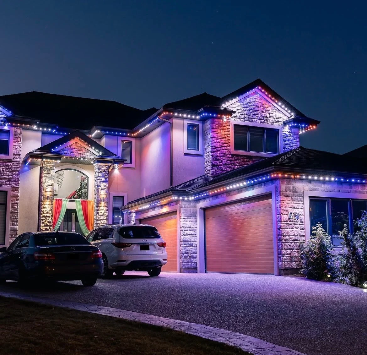 A home displaying a red, white and blue Canstar roofline scene